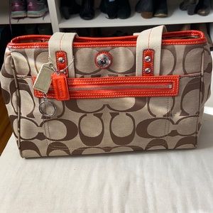 Orange and tan signature C Coach Handbag